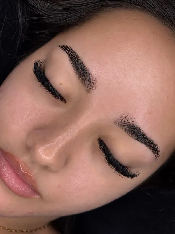 A volume lash set, eyes closed